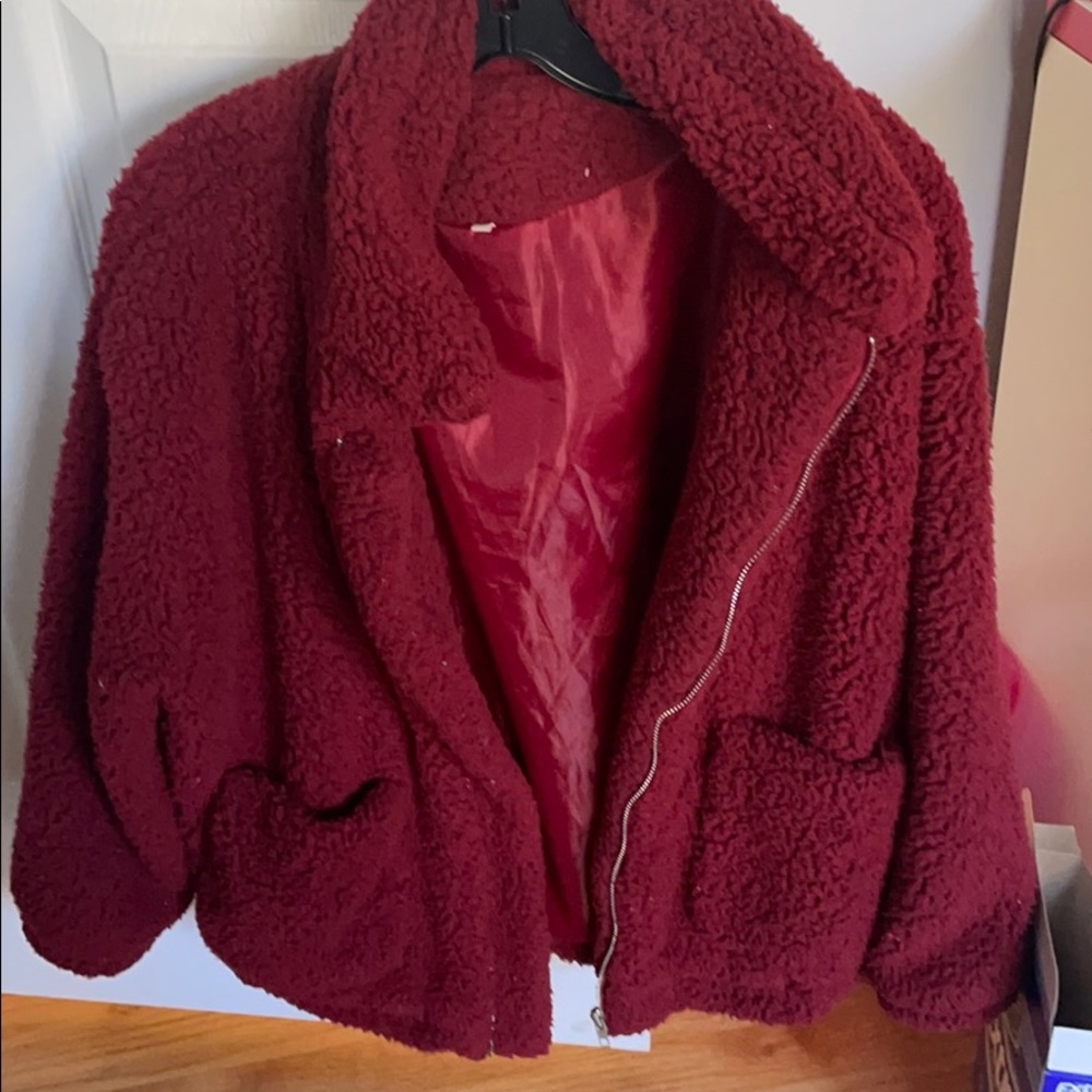 Red fluffy zip up jacket